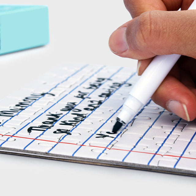 Close up of handwriting on blank lined letter jigsaw puzzle by Pikkii with marker