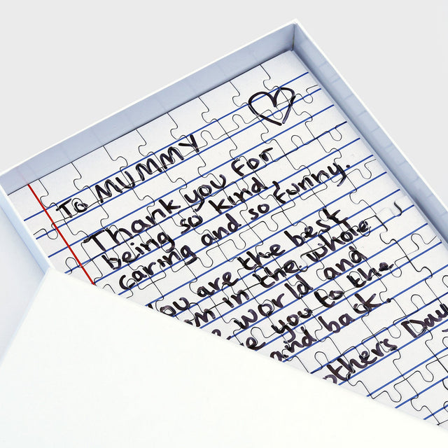 Pikkii personalised letter jigsaw puzzle in gift box with lid half off showing personalised Mother's day message to Mummy
