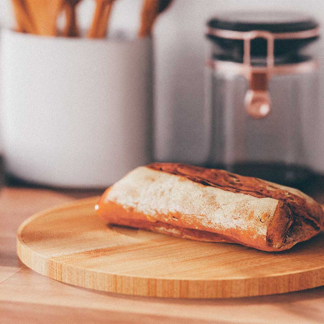 12" Inch Chopping Board with a loaf of bread